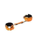 ερωτικό αξεσουάρ, το οποίο λάμπει στο σκοτάδι, πορτοκαλί